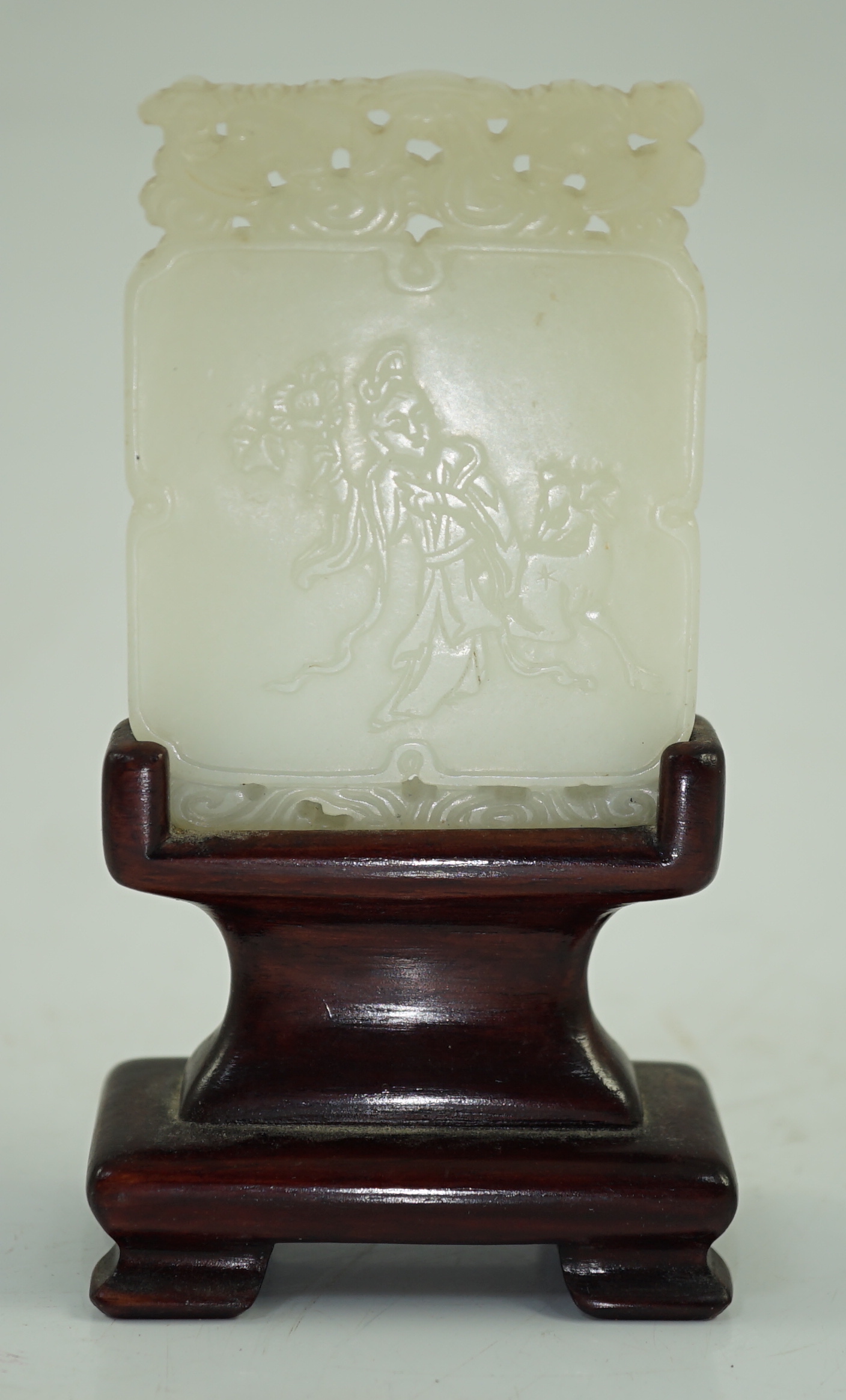 A Chinese carved white jade pendant plaque, 18th/19th century